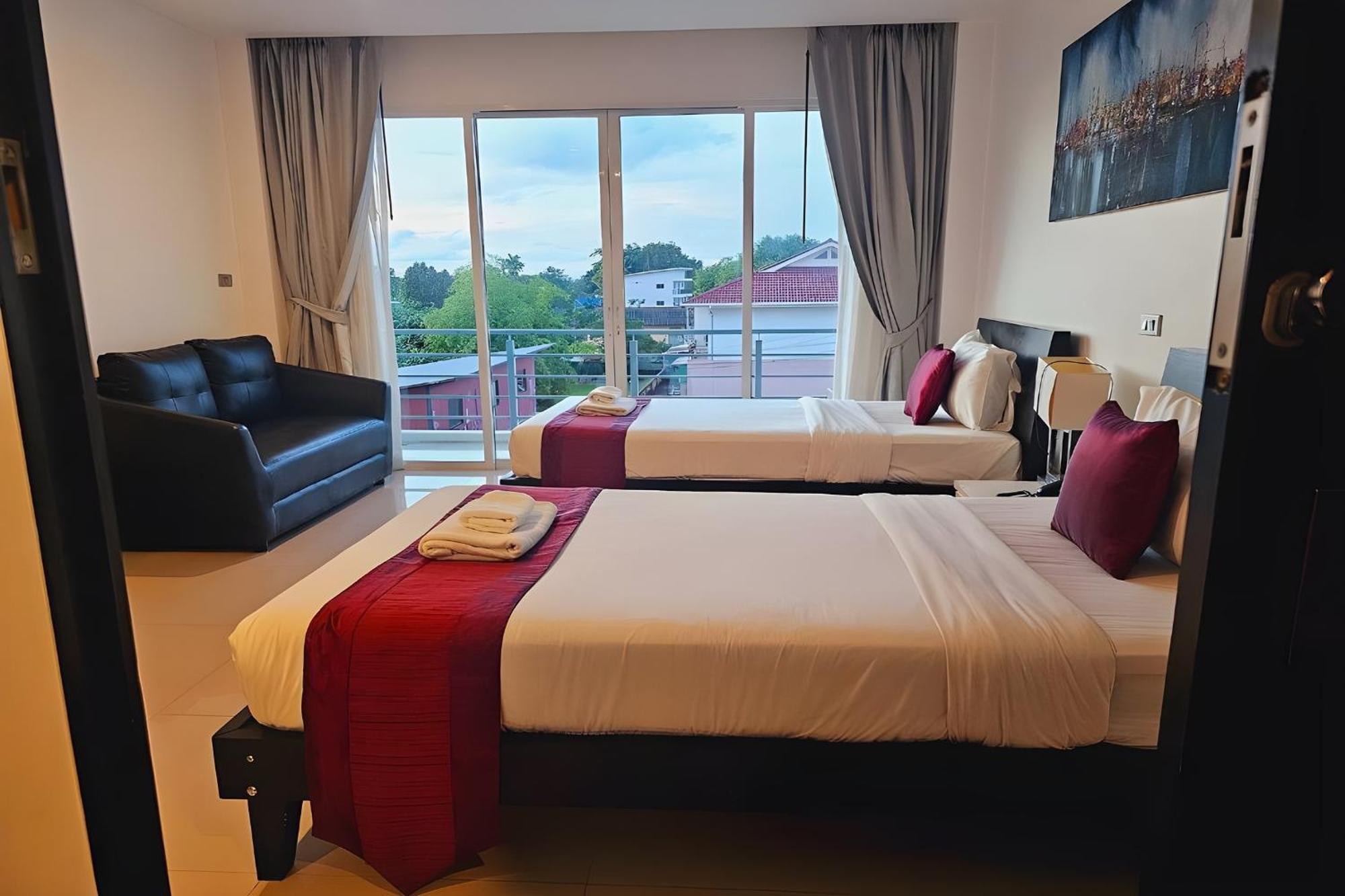 One World One Home Naiharn Hotel Rawai Buitenkant foto