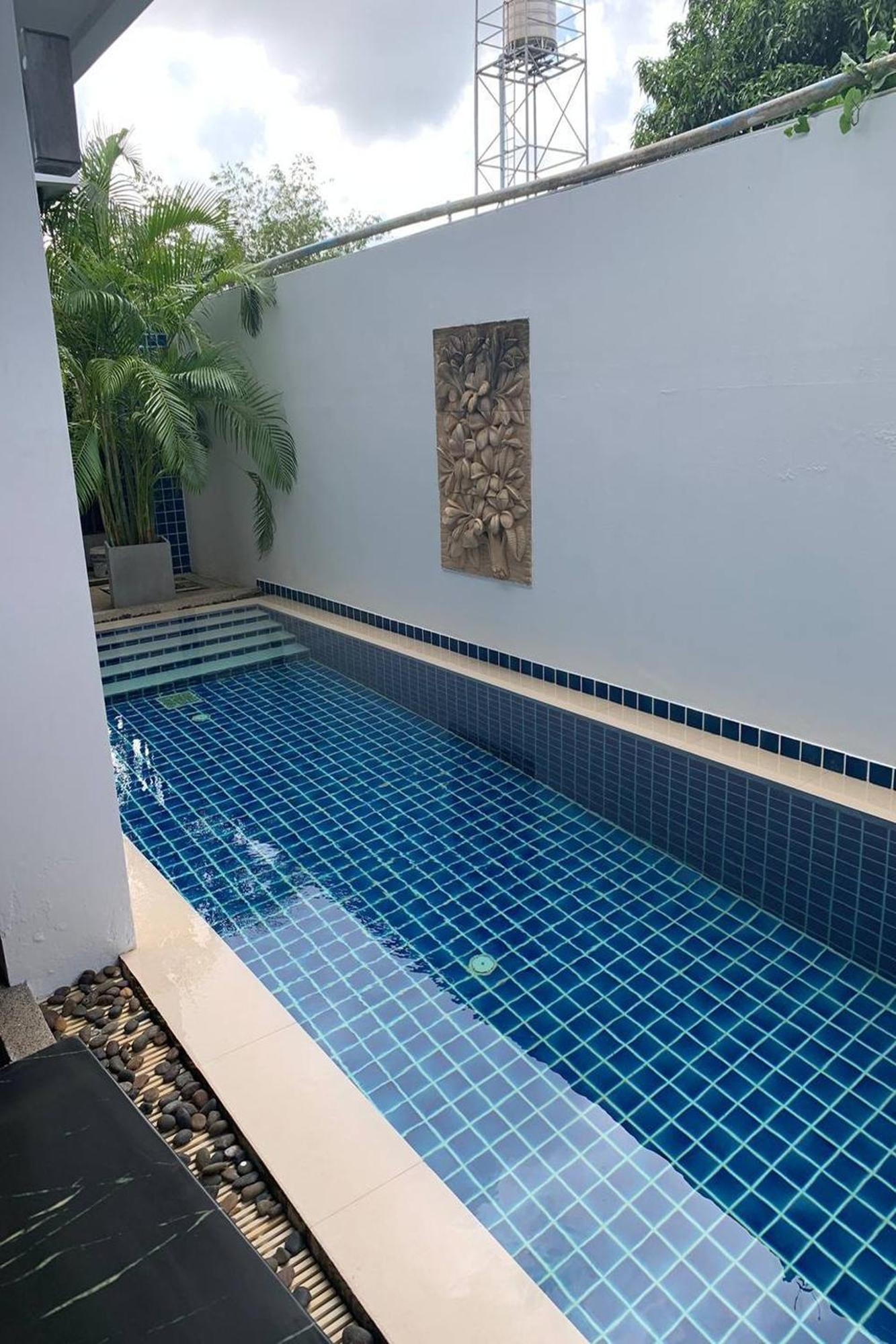 One World One Home Naiharn Hotel Rawai Buitenkant foto