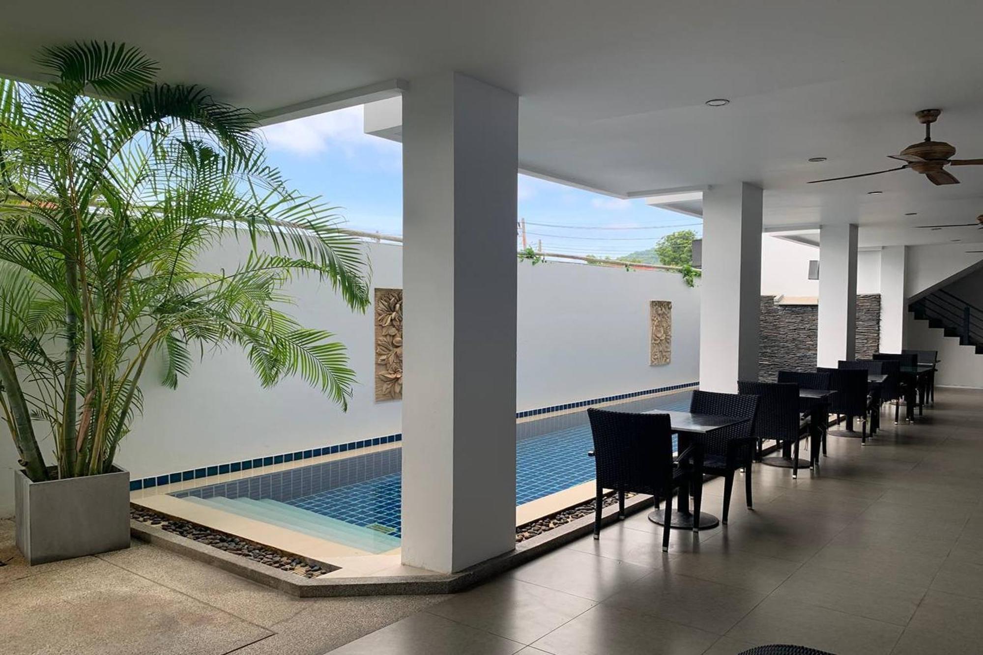 One World One Home Naiharn Hotel Rawai Buitenkant foto
