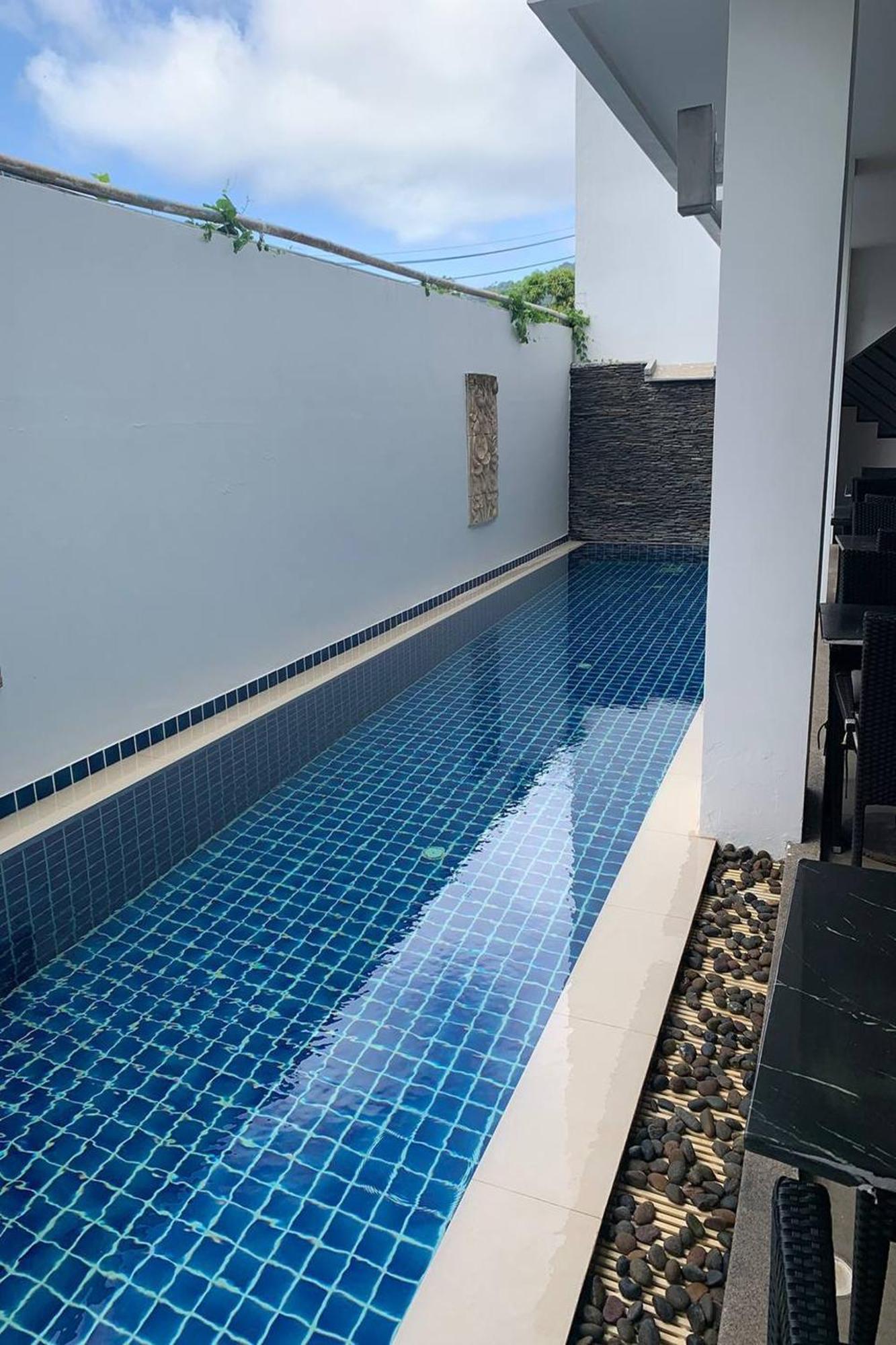 One World One Home Naiharn Hotel Rawai Buitenkant foto