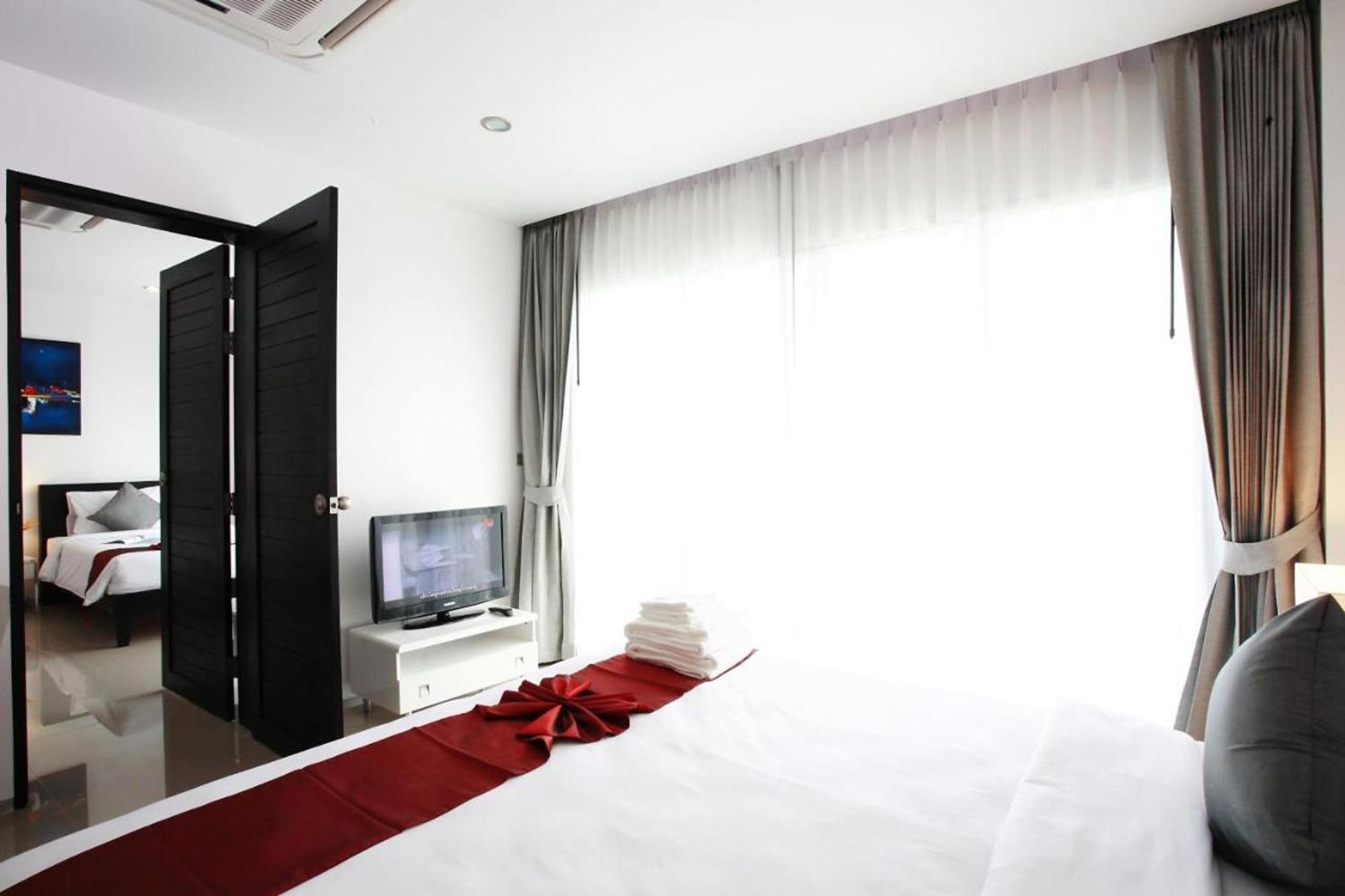 One World One Home Naiharn Hotel Rawai Buitenkant foto